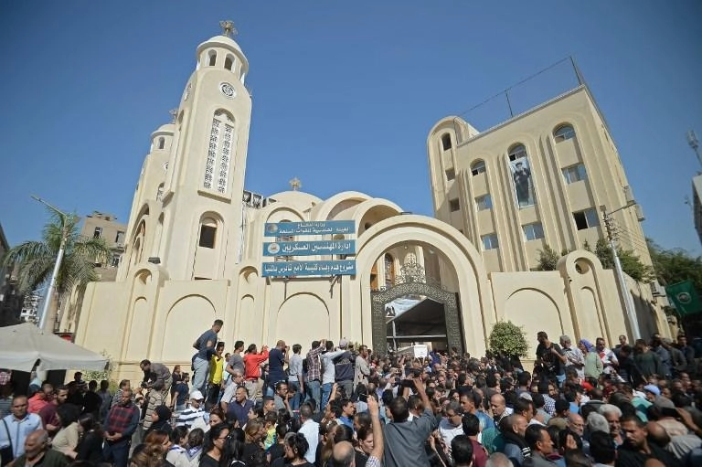 أقباط المنيا يشيّعون ضحاياهم في أجواء غاضبة