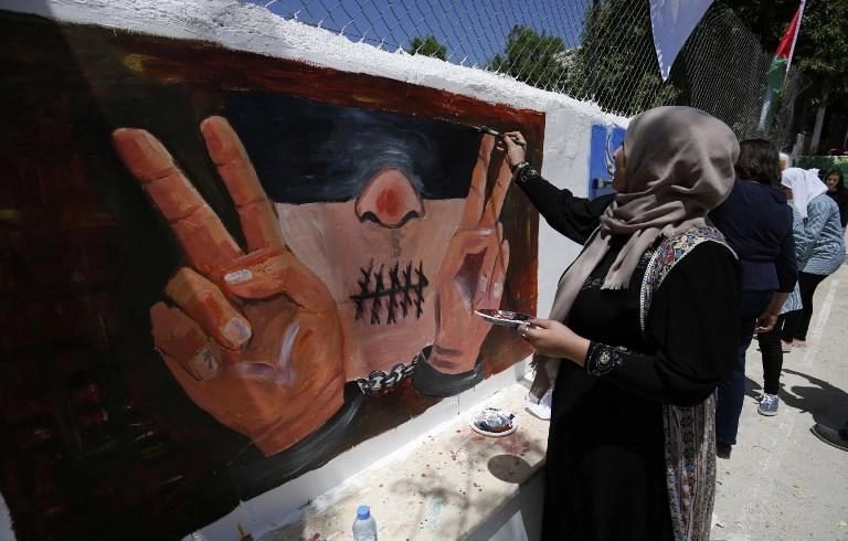 49 أسيرة لدى الاحتلال