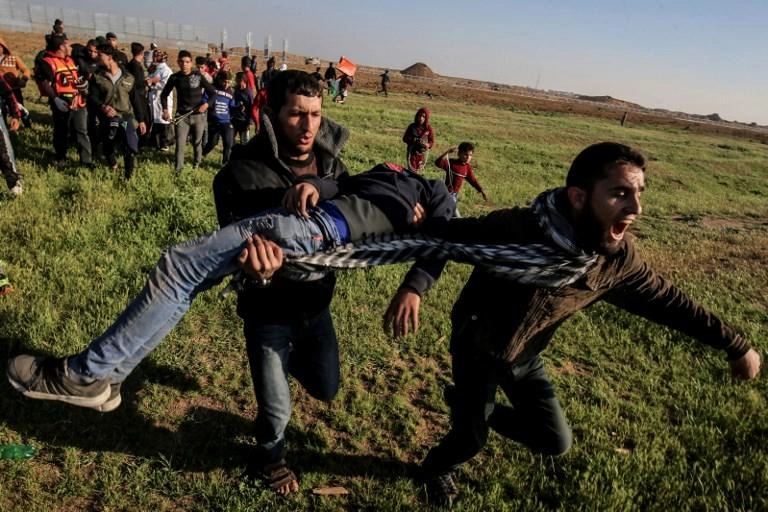إصابة 12 فلسطينيا برصاص الاحتلال