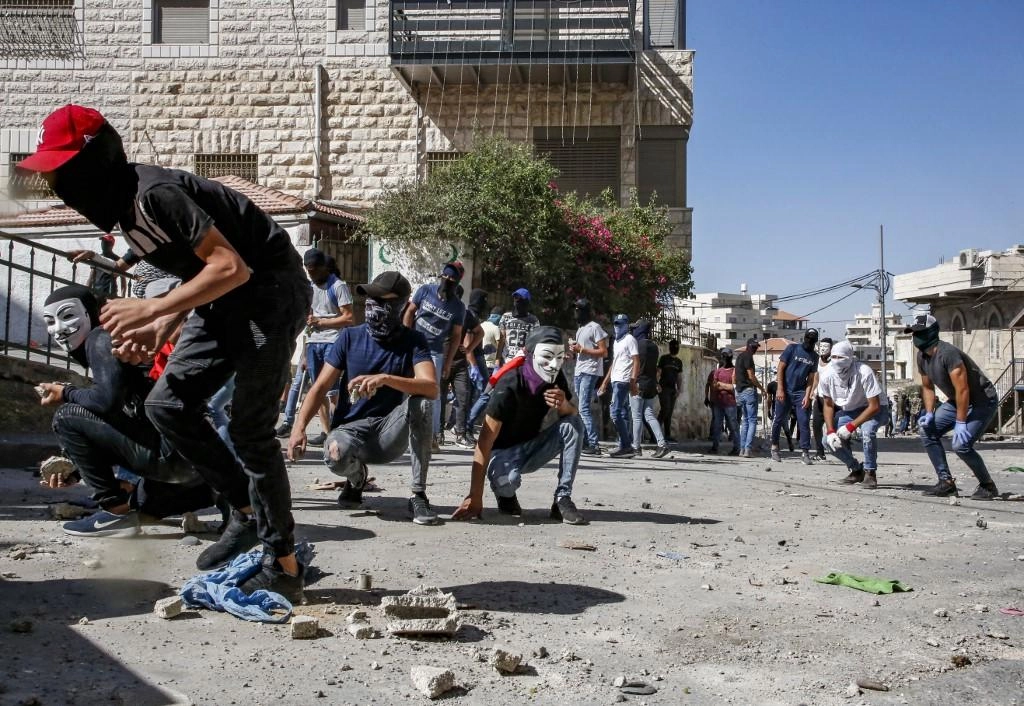 اعتقال 4 فلسطينيين بينهم طفلان في القدس