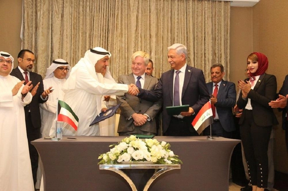 الكويت والعراق يوقعان اتفاقية لتطوير حقول نفط مشتركة