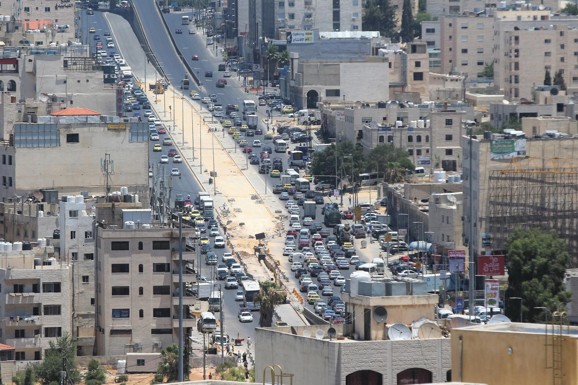 زيارات لإطلاع تجار متضررين على خطط المشروع