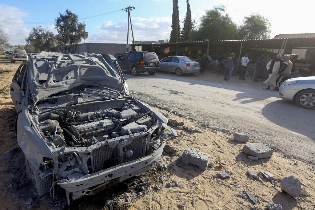 ماكرون والسيسي يدعوان إلى ضبط النفس في ليبيا